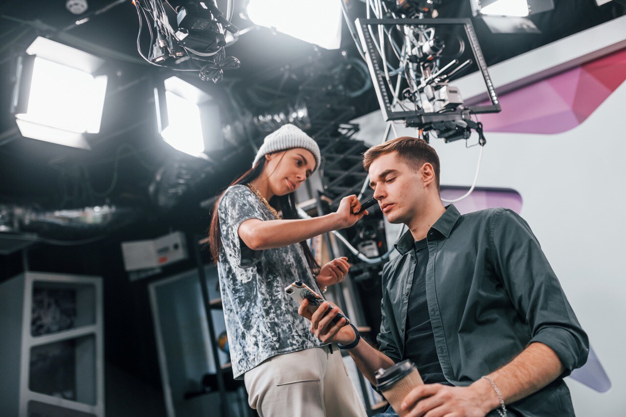 young-man-is-preparing-for-tv-online-broadcast-wo-2023-11-27-05-32-56-utc Large